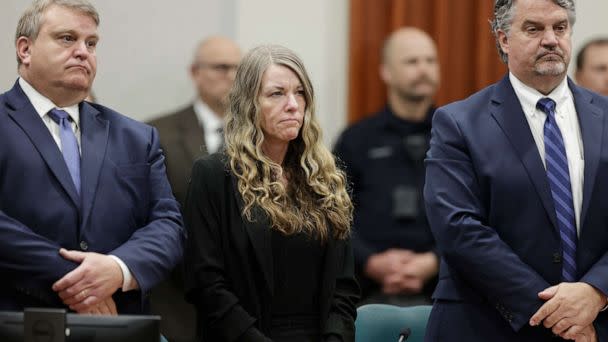 PHOTO: Lori Vallow Daybell stands and listens as the jury's verdict is read at the Ada County Courthouse in Boise, Idaho on Friday May 12, 2023. The Idaho jury convicted Daybell of murder in the deaths of her two youngest children. (Kyle Green/AP)