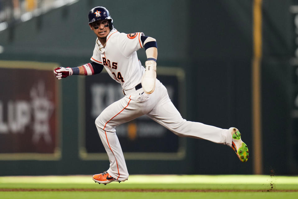 Houston Astros' Mauricio Dubon runs to third after a failed pickoff-attempt of Dubon at first by Kansas City Royals starting pitcher Jonathan Heasley during the fifth inning of a baseball game, Monday, July 4, 2022, in Houston. (AP Photo/Eric Christian Smith)