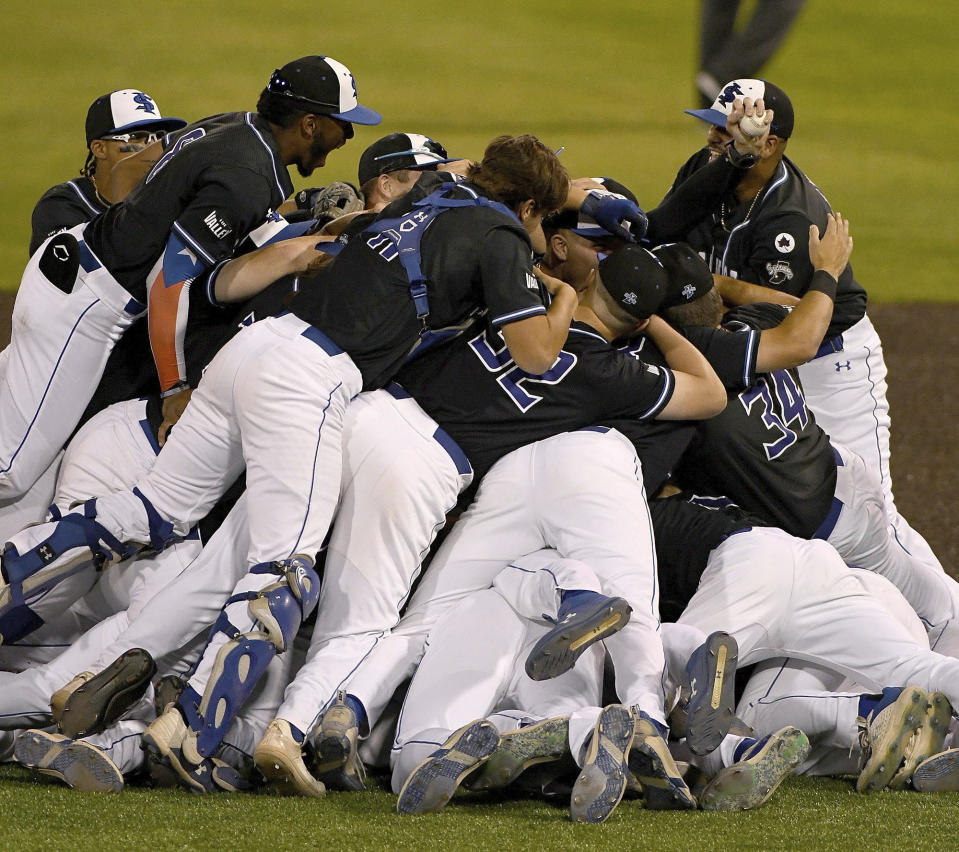 Indiana State celebrate after they defeated Iowa in the final game of the NCAA college baseball regional tournament, Sunday, June 4, 2023 at Bob Warn Field in Terre Haute, Ind. (Joseph C. Garza/The Tribune-Star via AP)