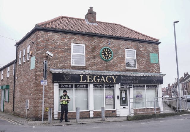 A police officer outside the Beckside branch of Legacy Independent Funeral Directors in Hull