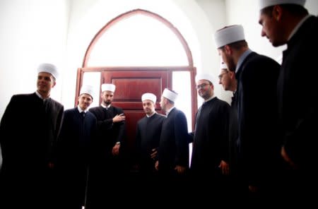 Bosnian Imams wait for a collective Sharia wedding ceremony for sixty couples in Sarajevo, Bosnia and Herzegovina July 19, 2018. REUTERS/Dado Ruvic