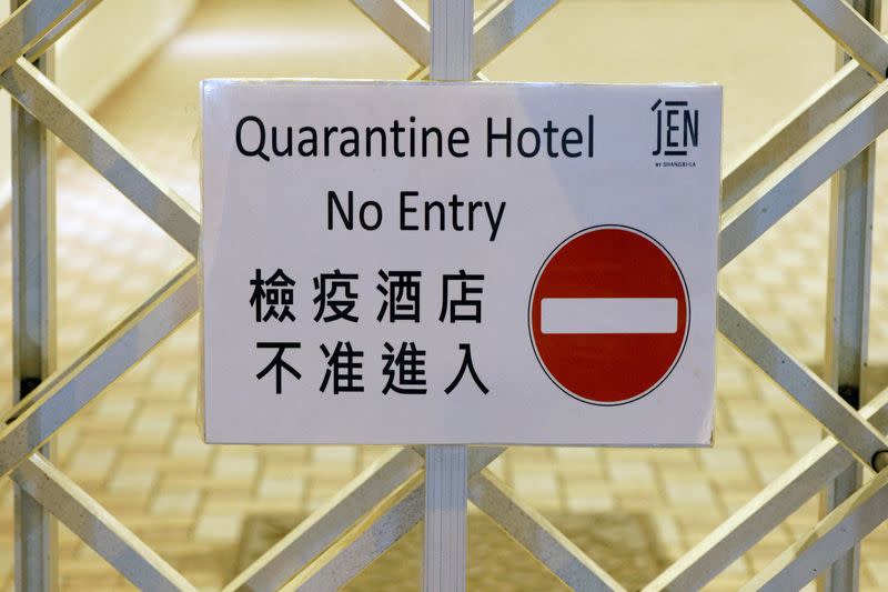 FILE PHOTO: A sign is seen inside a quarantine hotel, during the coronavirus disease (COVID-19) pandemic, in Hong Kong