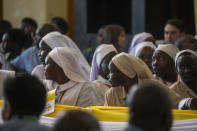 Nuns wait for the arrival of Pope Francis for a meeting with priests, deacons, consecrated people and seminarians at the Cathedral of Saint Theresa in Juba, South Sudan, Saturday, Feb. 4, 2023. Francis is in South Sudan on the second leg of a six-day trip that started in Congo, hoping to bring comfort and encouragement to two countries that have been riven by poverty, conflicts and what he calls a "colonialist mentality" that has exploited Africa for centuries. (AP Photo/Gregorio Borgia)