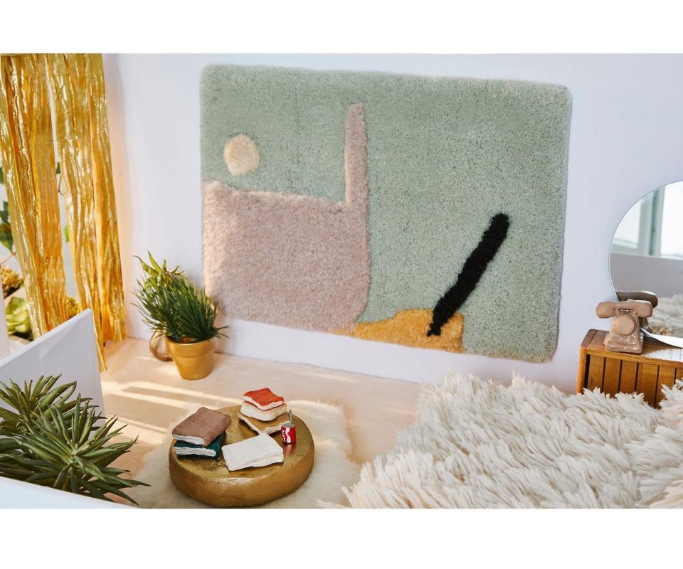 <h2>Cold Picnic Out In Palm Springs Rug</h2><br>Another must-have from the OG funky rug retailer, Cold Picnic. This piece is so artsy, you might want to hang it on the wall. <br><br><em>Shop</em> <a href="https://coldpicnic.com/collections/rugs" rel="nofollow noopener" target="_blank" data-ylk="slk:Cold Picnic" class="link rapid-noclick-resp"><strong><em>Cold Picnic</em></strong></a><br><br><strong>Cold Picnic</strong> Out in Palm Springs, $, available at <a href="https://go.skimresources.com/?id=30283X879131&url=https%3A%2F%2Fcoldpicnic.com%2Fcollections%2Frugs%2Fproducts%2Foutinpalmsprings" rel="nofollow noopener" target="_blank" data-ylk="slk:Cold Picnic" class="link rapid-noclick-resp">Cold Picnic</a>