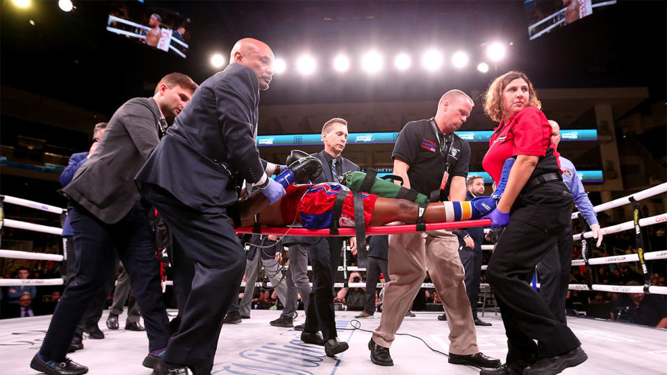 Patrick Day is taken out of the ring after being knocked out in his Super-Welterweight bout against Charles Conwell at Wintrust Arena on October 12, 2019 in Chicago, Illinois. (Photo by Dylan Buell/Getty Images)