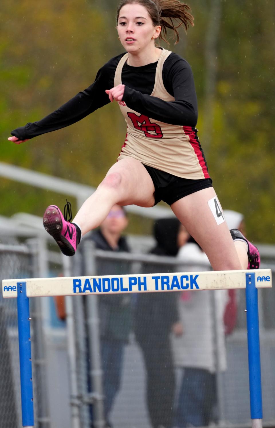 Morgan Ryerson, of Mount Olive, clears the last hurdle, on her way to first place in the final heat of the 400 meter intermediate hurdles, in Randolph, during the Morris County Relays. Wednesday, May 3, 2023 