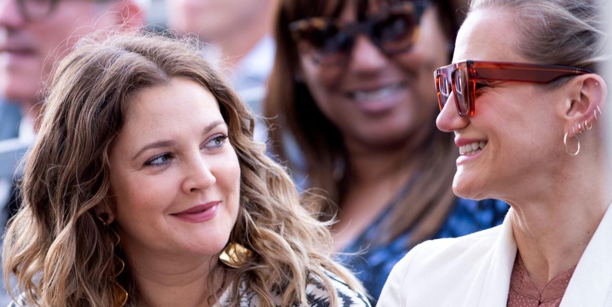 drew barrymore and cameron diaz smiling at each other