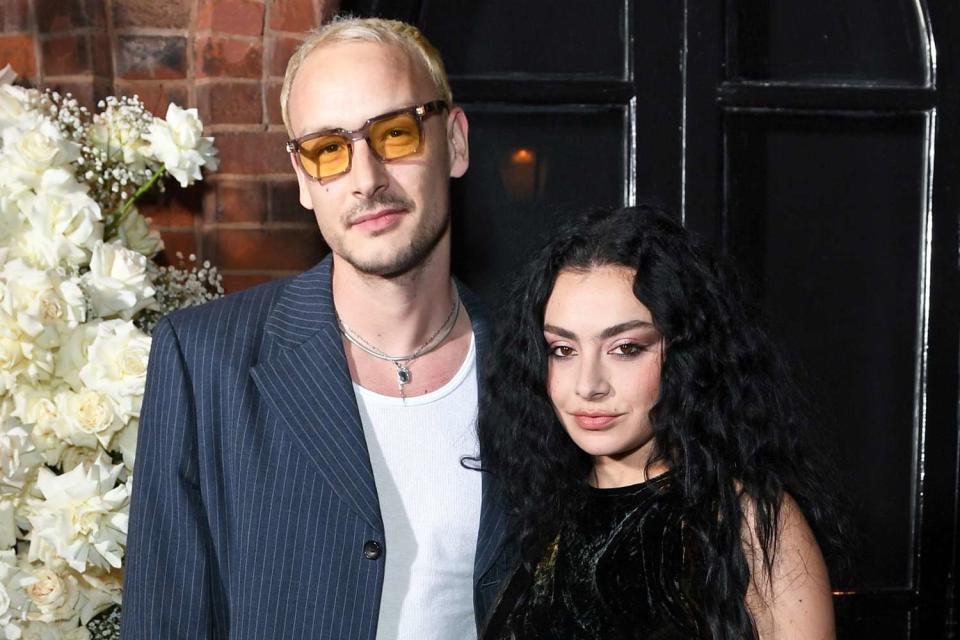 <p>David M. Benett/Jed Cullen/Dave Benett/Getty</p> George Daniel and Charli XCX