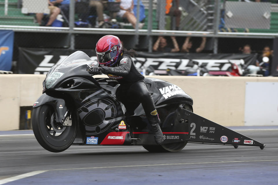 In this photo provided by the NHRA, Pro Stock Motorcycle's Angelle Sampey rides to her first win of the season in the final round at Summit Racing Equipment Motorsports Park at the Summit Racing Equipment NHRA Nationals in Norwalk, Ohio, Sunday, June 26, 2022. (Bob Szelag/NHRA via AP)