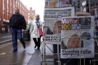 National newspapers display pictures of the new daughter of Britain's Prince William and wife Kate on their front covers in a newsagents in London on May 3, 2015