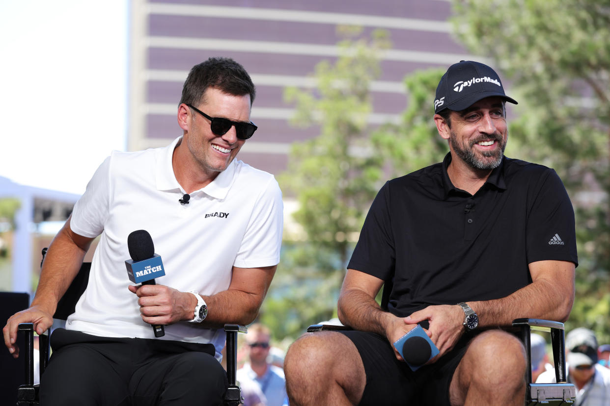 LAS VEGAS, NEVADA - JUNE 01: Tom Brady and Aaron Rodgers take part in the Bleacher Report Hot Seat Press Conference prior to Capital One's The Match VI - Brady & Rodgers v Allen & Mahomes at Wynn Golf Club on June 01, 2022 in Las Vegas, Nevada. (Photo by Carmen Mandato/Getty Images for The Match)