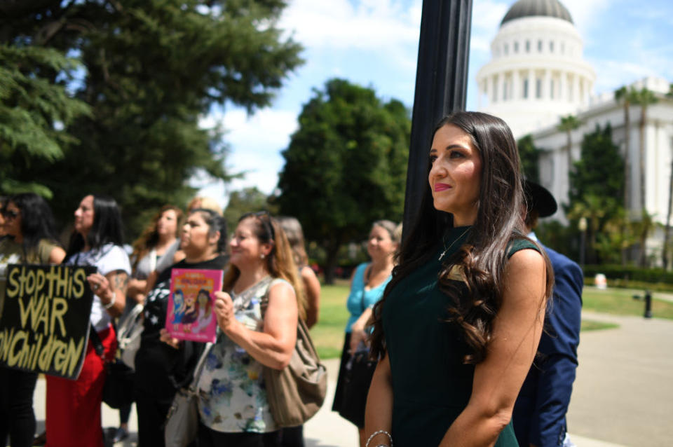 Chino Valley school board president Sonja Shaw listens to speakers in front of the state Capitol on bills related to LGBTQ school curriculum in Sacramento.