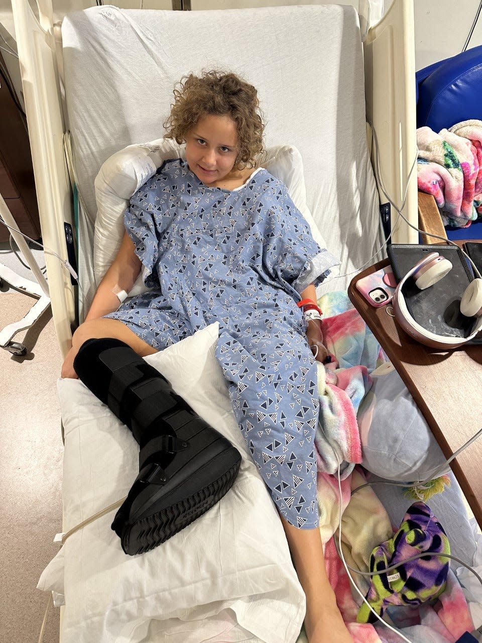 Jasmine Carney, 10, of Palm City recuperating at St. Mary's Hospital following a shark bite Nov. 27, 2022.