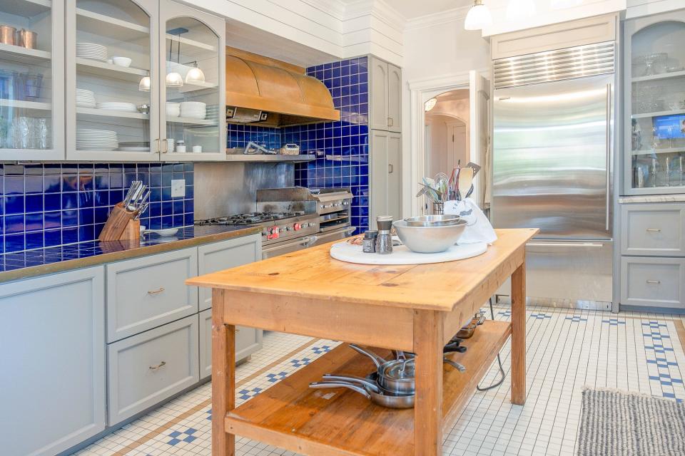 Traditional details and a mix of materials brought a timeless attitude to this updated kitchen.