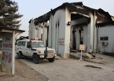 A vehicle is parked in front of a damaged building at Medecins Sans Frontieres (MSF) in Kunduz, Afghanistan October 16, 2015. REUTERS/Stringer