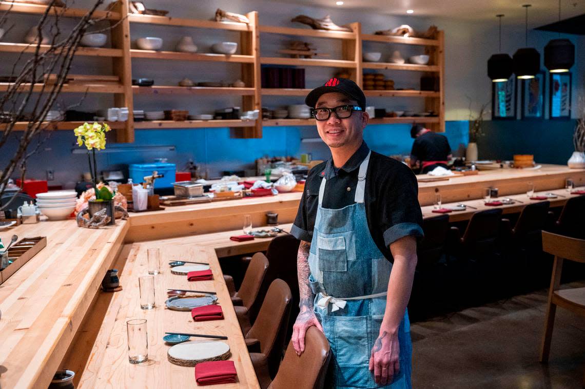 Kru Contemporary Japanese Cuisine chef and co-owner Billy Ngo stands at the East Sacramento restaurant Friday.
