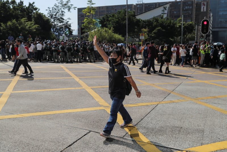 Hong Kong holds its breath ahead of polls amid a lull in violence