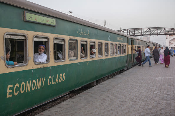 A standard economy class train, operated by Pakistan Railways, sitting at Karachi Cantonment railway station in Karachi, Pakistan. Beijing is set to upgrade a 1,163-miles track from Karachi to Peshawar near the Afghan border with an $8 billion loan to Pakistan. It’s part of Chinese President Xi Jinping’s Belt and Road trade initiative, which includes $60 billion of badly-needed works financed in Pakistan. Photographer: Asim Hafeez/Bloomberg