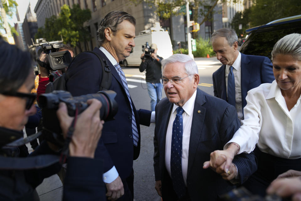 Democratic U.S. Sen. Bob Menendez of New Jersey and his wife Nadine Menendez arrive to the federal courthouse in New York, Wednesday, Sept. 27, 2023. Menendez is due in court to answer to federal charges alleging he used his powerful post to secretly advance Egyptian interests and carry out favors for local businessmen in exchange for bribes of cash and gold bars. (AP Photo/Seth Wenig)