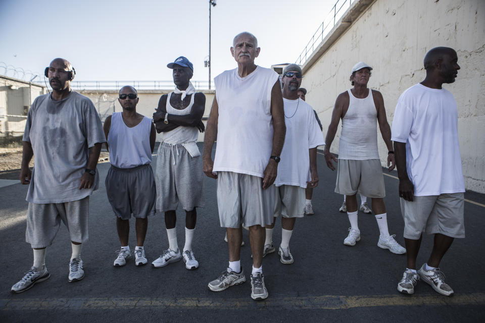 Members of San Quentin's 1000 Mile Club, including Larry Ford (center).