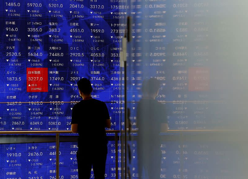 FILE PHOTO: Japan's Nikkei plunges to 7-month low as yen rallies