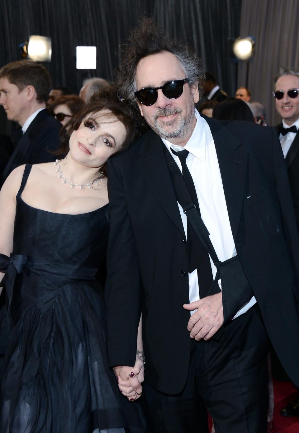 Filmmaker Tim Burton and actress Helena Bonham Carter arrive at the Oscars at Hollywood & Highland Center on February 24, 2013 (Getty Images)