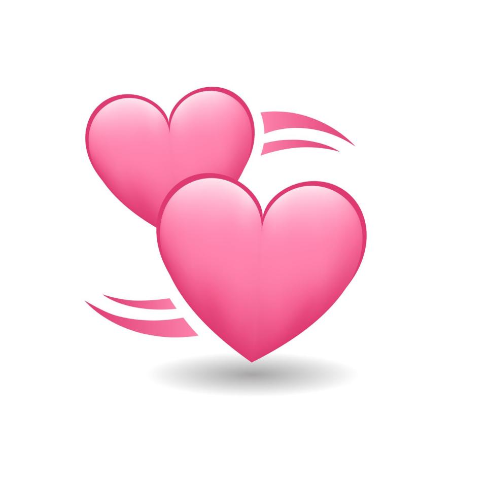 revolving pink heart emoji with one heart in back of another and two swooshes to either side indicating they are orbiting each other