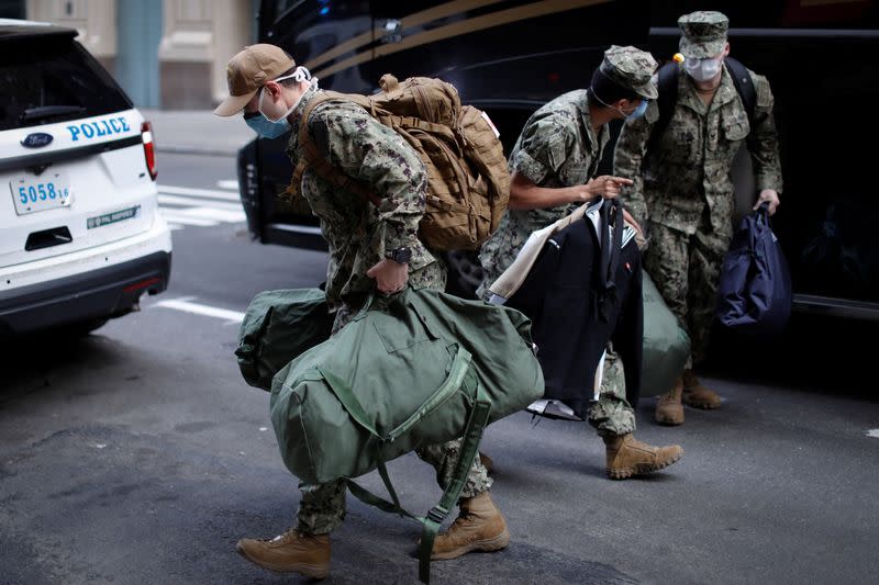 U.S. Navy personnel arrive in Manhattan during the outbreak of the coronavirus disease (COVID-19) in New York