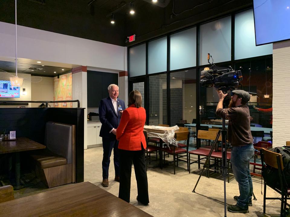 Republican presidential candidate Asa Hutchinson watched the results come in at his Caucus day watch party at Gusto Pizza Bar in Des Moines on Monday, Jan. 15, 2024.