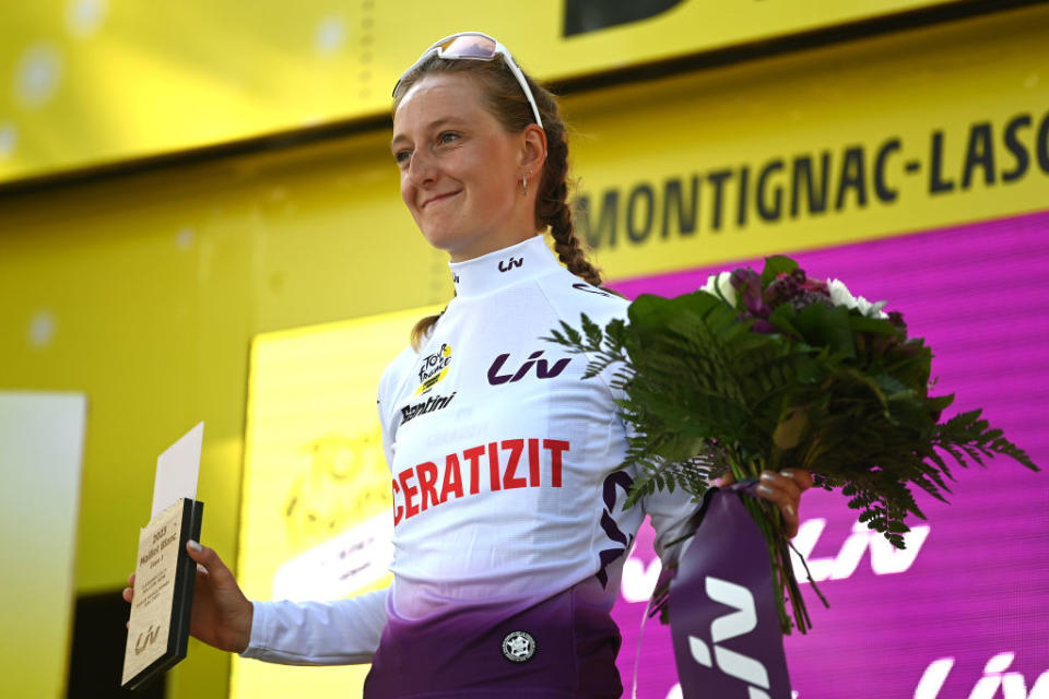 MONTIGNACLASCAUX FRANCE  JULY 25 Cédrine Kerbaol of France  and Team CERATIZITWNT Pro Cycling  White Best Young Rider Jersey celebrates at podium during the 2nd Tour de France Femmes 2023 Stage 3 a 1472km stage from CollongeslaRouge to MontignacLascaux  UCIWWT  on July 25 2023 in MontignacLascaux France Photo by Alex BroadwayGetty Images