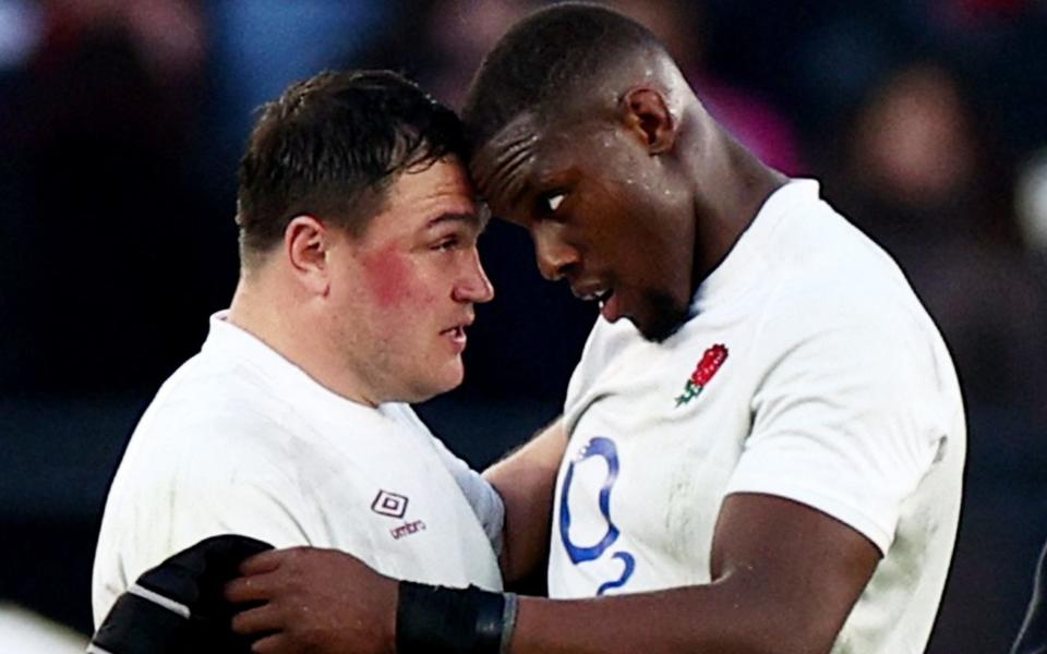 Jamie George and Maro Itoje hug after England beat Italy