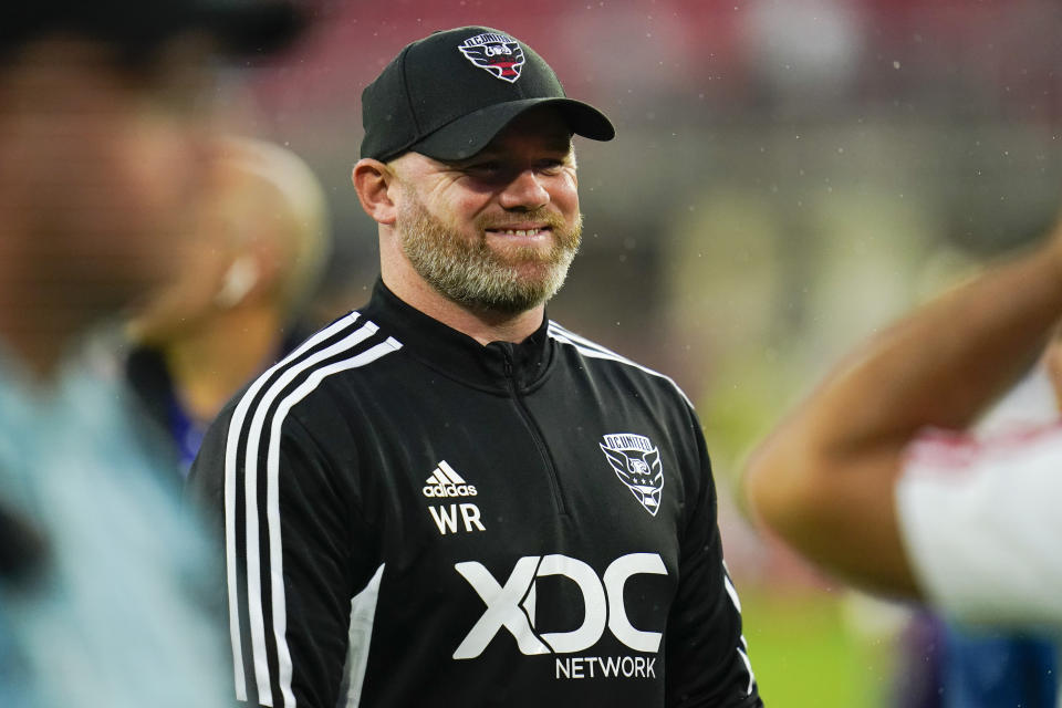 D.C. United head coach Wayne Rooney reacts after an MLS soccer match against Orlando City, Sunday, July 31, 2022, in Washington. D.C. United won 2-1. (AP Photo/Julio Cortez)