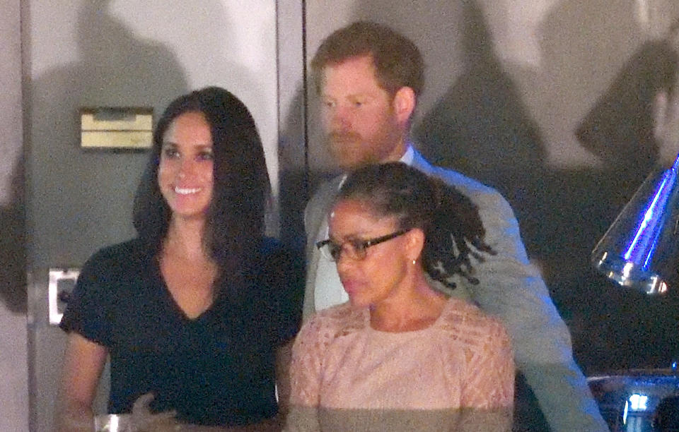 <p>Harry and Meghan made another appearance at the Invictus Games alongside Meghan’s mum, Doria. The trio sat in the royal box at the closing ceremony with Harry giving his girlfriend a kiss on the cheek.<br><i>[Photo: Getty]</i> </p>