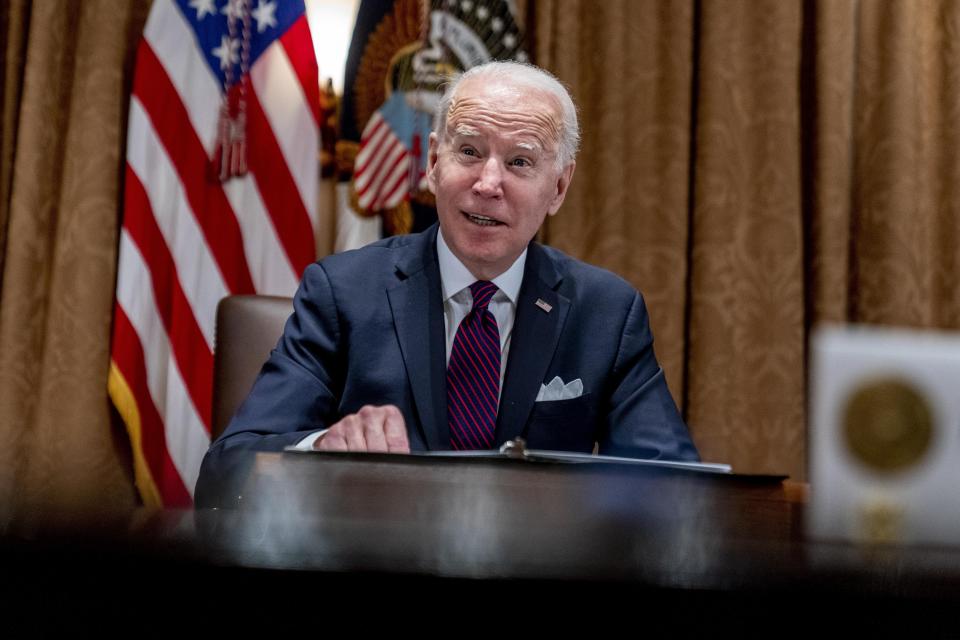 President Joe Biden meets with members of the Infrastructure Implementation Task Force to discuss the Bipartisan Infrastructure Law, in the Cabinet Room at the White House in Washington, Thursday, Jan. 20, 2022. (AP Photo/Andrew Harnik)