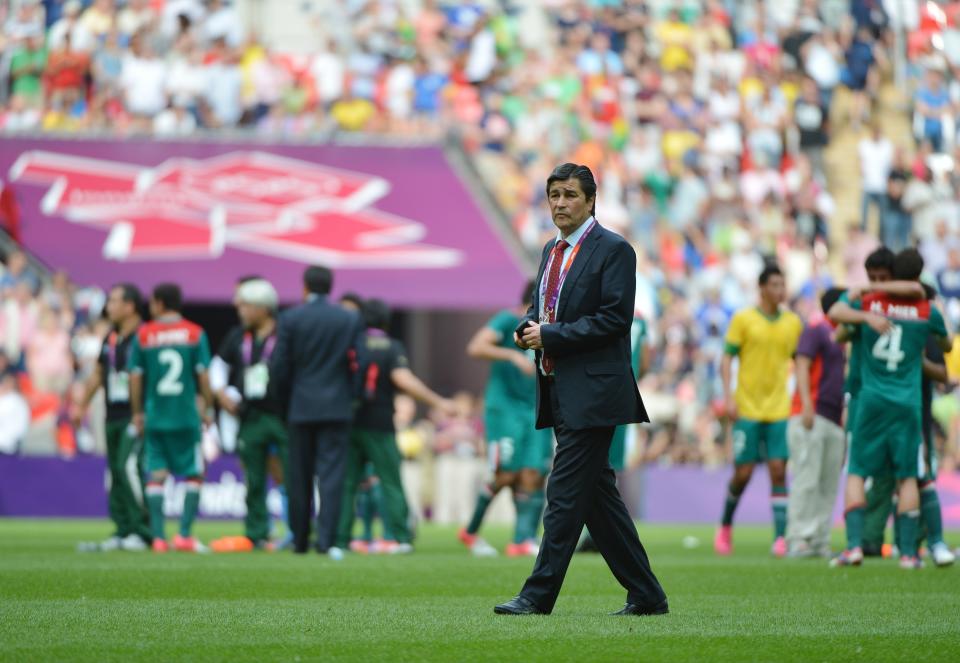 Mexico's coach Luis Fernando Tena is pictured after the men's football final match between Brazil and Mexico at Wembley stadium during the London 2012 Olympic Games on August 11, 2012 in London. Mexico won 2-1.   AFP PHOTO / KHALED DESOUKI        (Photo credit should read KHALED DESOUKI/AFP/GettyImages)