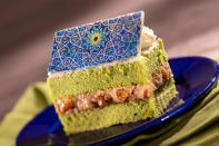 <p><strong>Morocco</strong></p> <p>Stop by Tangierine Café: Flavors of the Medina to snag this sweet treat. The pistachio cake is sandwiched in between cinnamon pastry cream and candied walnuts.</p>  