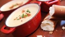 <p>This creamy soup is one of Disney's most popular recipes. Found at Le Cellier Steakhouse inside the Canada pavilion in Epcot, it is the ultimate rainy day meal.</p> <p><strong>Get the recipe <a href="https://disneyparks.disney.go.com/blog/2020/05/disneymagicmoments-recipe-for-popular-canadian-cheddar-cheese-soup-from-le-cellier-steakhouse-at-epcot-first-time-release-on-disney-parks-blog/" rel="nofollow noopener" target="_blank" data-ylk="slk:HERE;elm:context_link;itc:0;sec:content-canvas" class="link ">HERE</a></strong></p>