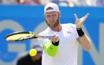 Australia's Sam Groth in action during his semi final match against Italy's Thomas Fabbiano