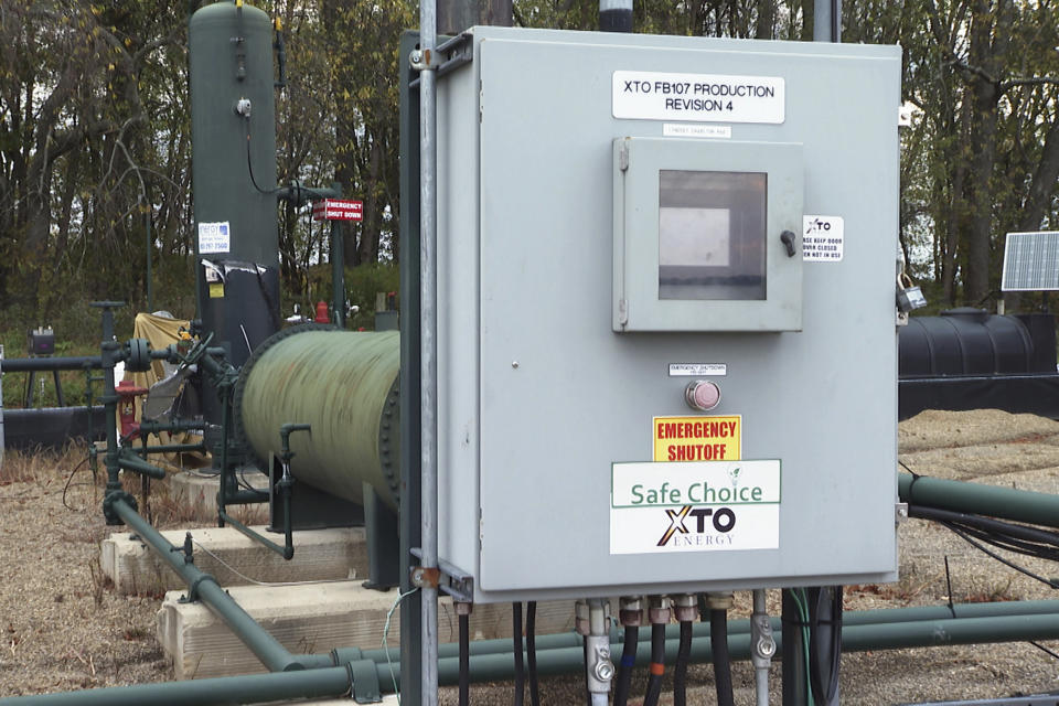 An XTO Energy natural gas fracking well pad is seen in Freeport, Pennsylvania, on Thursday, Oct. 15, 2020. President Trump accuses Joe Biden of wanting to ban fracking, a sensitive topic in the No. 2 natural gas state behind Texas. Biden insists he does not want to ban fracking broadly - he wants to ban it on federal lands and make electricity production fossil-fuel free by 2035. (AP Photo/Ted Shaffrey)