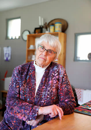 Clara Jas sits at her table in her house in Zwolle, the Netherlands April 3, 2018. REUTERS/Michael Kooren/Files