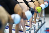 LONDON, ENGLAND - AUGUST 01: Bronte Barratt yellow cap) of Australia gets set for the start of the Final of the Women's 4x200m Freestyle Relay on Day 5 of the London 2012 Olympic Games at the Aquatics Centre on August 1, 2012 in London, England. (Photo by Al Bello/Getty Images)