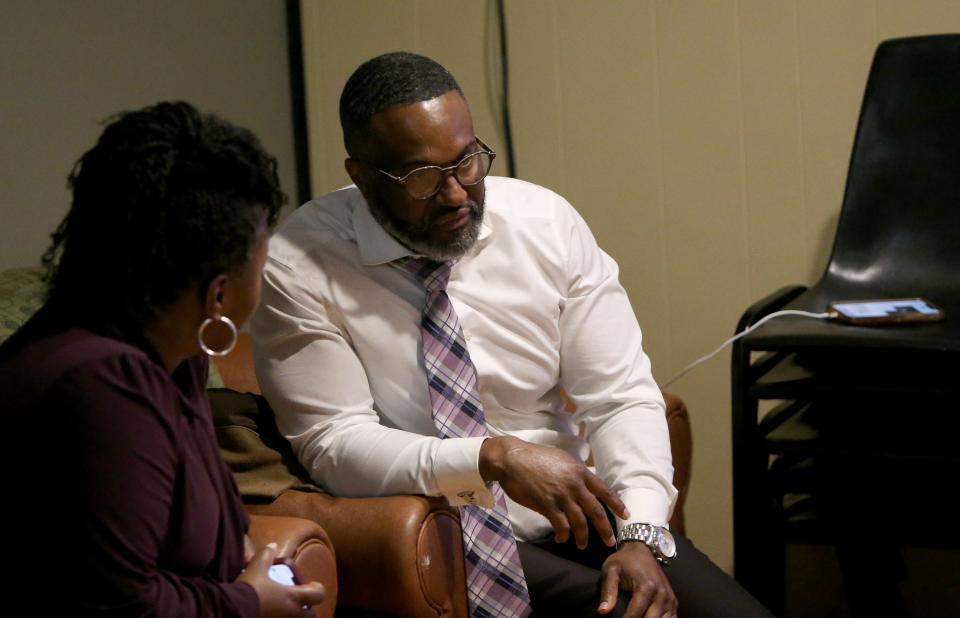 Henry Davis Jr., candidate for the Democratic nomination for South Bend mayor, speaks with his wife, Viressa,  Tuesday, May 2, 2023, at D Blues Spot & Bistro in South Bend for the 2023 primary election.