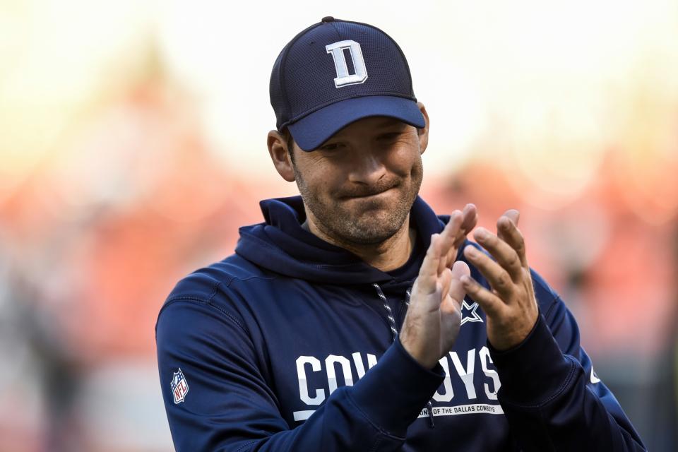 Even Tony Romo has to applaud what he's seen from his Cowboys' teammates as he recovers from a broken back. (AP)