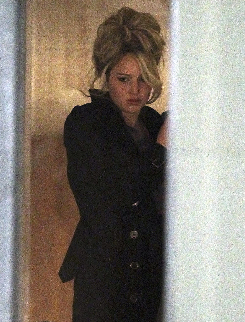 Semi-Exclusive... 51045245 Jennifer Lawrence shows off her character's 70's style updo while on set of Abscam in Boston, MA on March 22, 2013. In the highly anticipated production, Lawrence plays Marie Weinberg, the wife of Abscam FBI informant Mel Weinberg, who is played by Christian Bale. FameFlynet, Inc - Beverly Hills, CA, USA - 1 (818) 307-4813