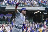 Chicago Cubs' Patrick Wisdom celebrates after hitting a three-run home run during the eighth inning of a baseball game against the Milwaukee Brewers Sunday, Sept. 19, 2021, in Milwaukee. (AP Photo/Morry Gash)