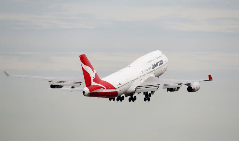 A Qantas Boeing 747 plane takes off at Kingsford Smith International Airport in Sydney