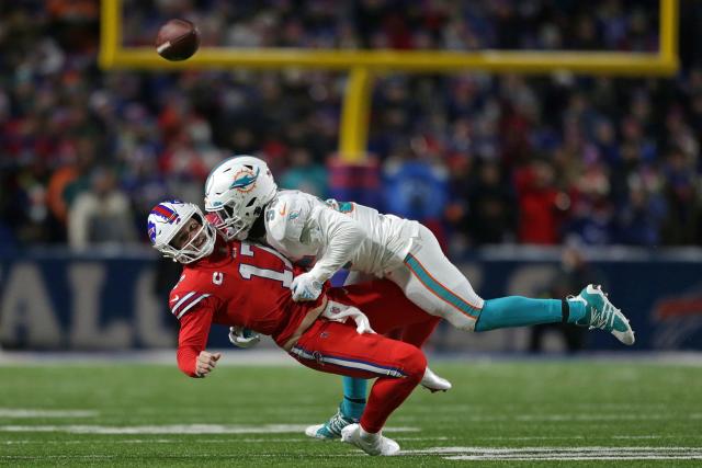 Miami Dolphins linebacker Jerome Baker (55) looks to defend during