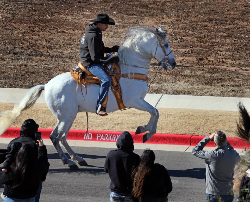 Horses and riders participate in a processional for the feast day of St. Juan Diego as it ends at Tepeyac Hill at the Blessed Stanley Rother Shrine, 700 SE 89 in Oklahoma City. Mandatory Credit: Steve Sisney-The Oklahoman
(Credit: Steve Sisney for The Oklahoman)