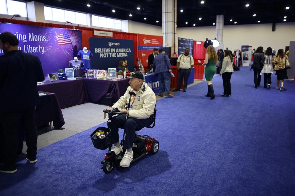 CPAC attendees visit booths promoting political groups and products for sale. <a href="https://media.gettyimages.com/id/1470814843/photo/conservatives-attend-the-annual-cpac-event.jpg?s=1024x1024&w=gi&k=20&c=ouPMEVq4i00TxkUlufKELh78GpYLg9noO6KbWaAfV8I=" rel="nofollow noopener" target="_blank" data-ylk="slk:Chip Somodevilla/Getty Images;elm:context_link;itc:0;sec:content-canvas" class="link ">Chip Somodevilla/Getty Images</a>