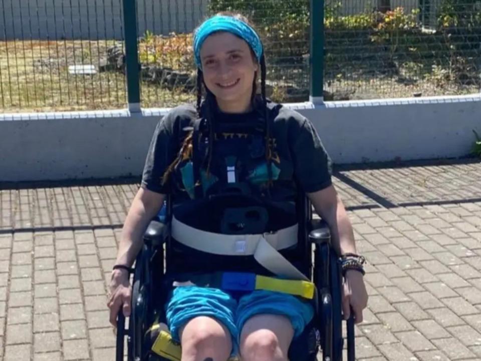 Danielle Drummond, 28, outside in a wheelchair. Ms Drummond was left paralysed from the waist down after she was accidentally crushed by a grand piano (GoFundMe)